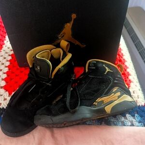 Kids Jordan MVP Black and Gold Sneakers